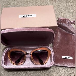 Miu Miu pink cat eye sunglasses